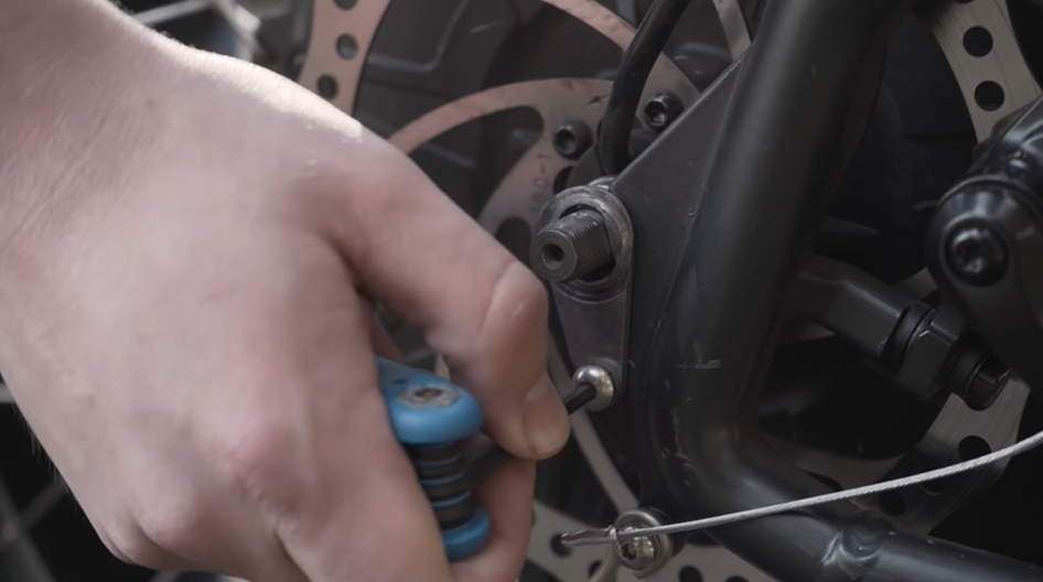 Remove torque arm bolt.png